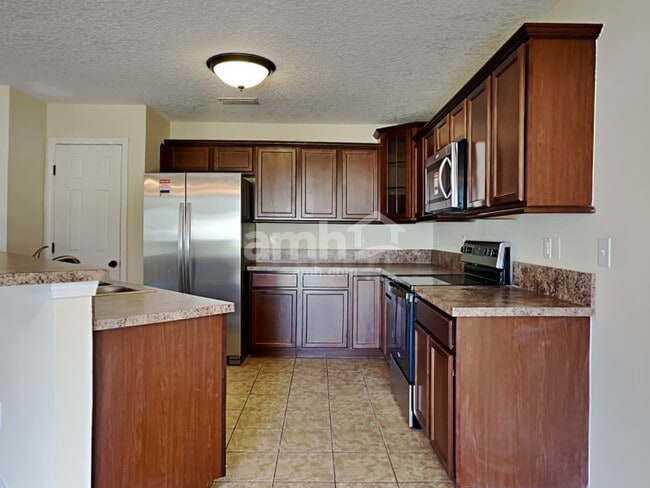 Building Photo - 7344 Rapid River Dr E