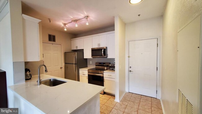Building Photo - 1600 Spring Gate Dr.