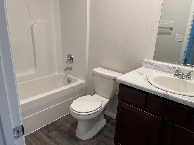 Building Photo - *New Year, New Home Special* BRAND NEW Thr...