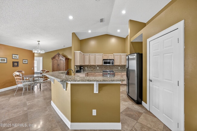 Building Photo - 10375 Woodley Creek Blvd