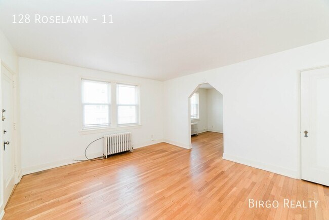 Building Photo - 1930s Elegance Meets Modern Comfort: Corne...