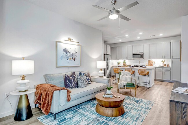 living room featuring light wood-type flooring - The Grove at Clermont