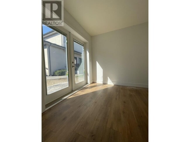 Photo du bâtiment - 625-625 W 53rd Ave
