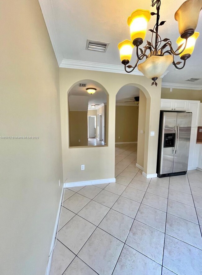 Building Photo - 5590 NW 107th Ave