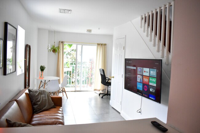 smart tv and dedicated work space - 835 SW 2nd St