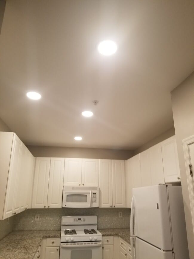 Kitchen with updated recess lighting - 2720 Bellforest Ct