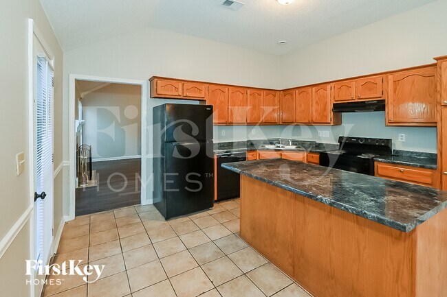 Building Photo - 7395 Kevin Rdg Cv E