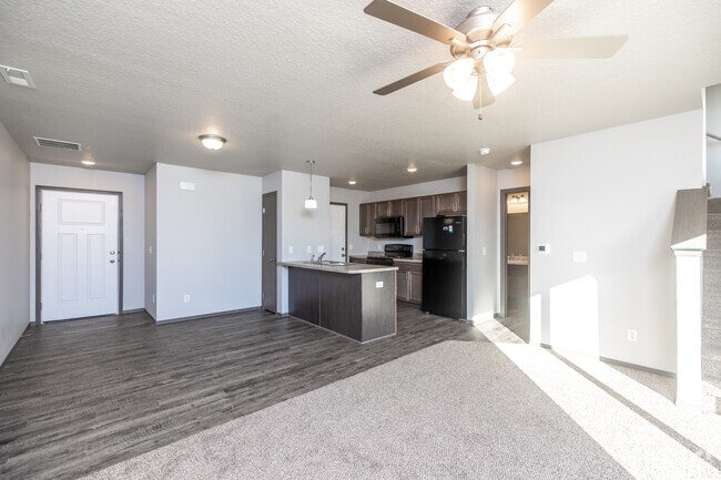 2BR, 1.5BA - Living Room - Prairie Village Commons I