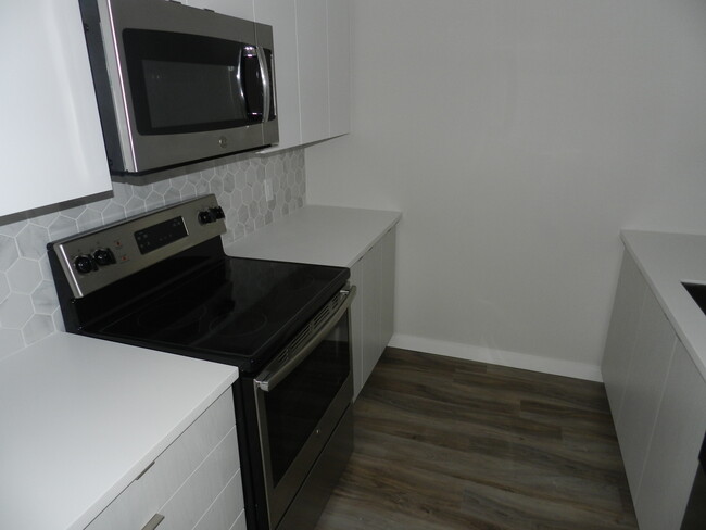 Building Photo - WELCOME TO THE UPSIDE - TWO BEDROOM APARTM...