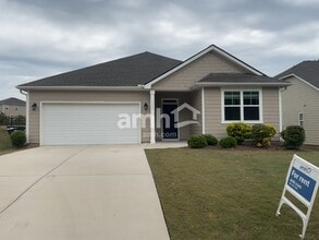 Building Photo - 7068 Creeksong Dr