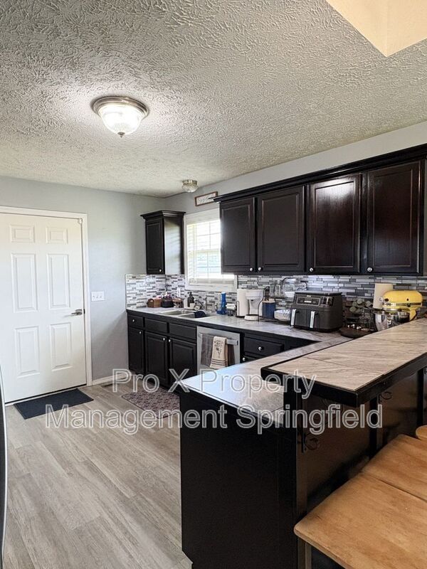 Building Photo - 4444 N Farm Rd 157