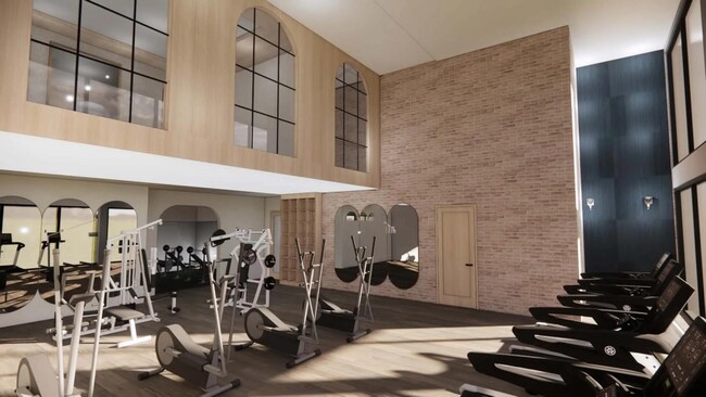 Club-quality fitness studio with spin bikes and fitness on-demand at Modera University Park in Denver, CO. - Modera University Park