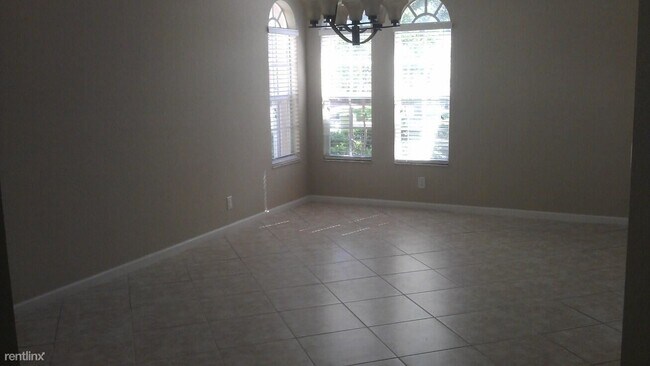 Foto del edificio - 4 br, 2.5 bath Condo - 16122 Poppyseed Cir...