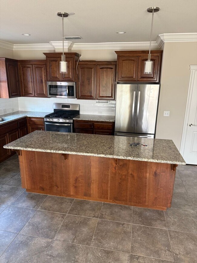 Foto del edificio - 3-bedroom, 2-bathroom home located in the ...