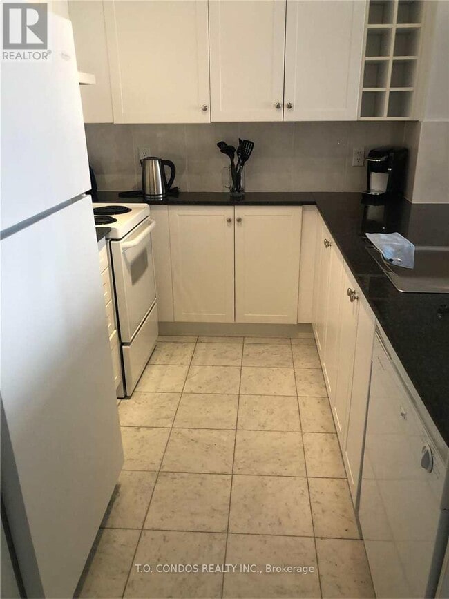 Photo du bâtiment - 210 Victoria St