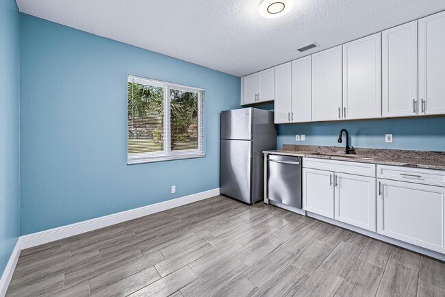 Building Photo - 9077 W Highland Pines Blvd