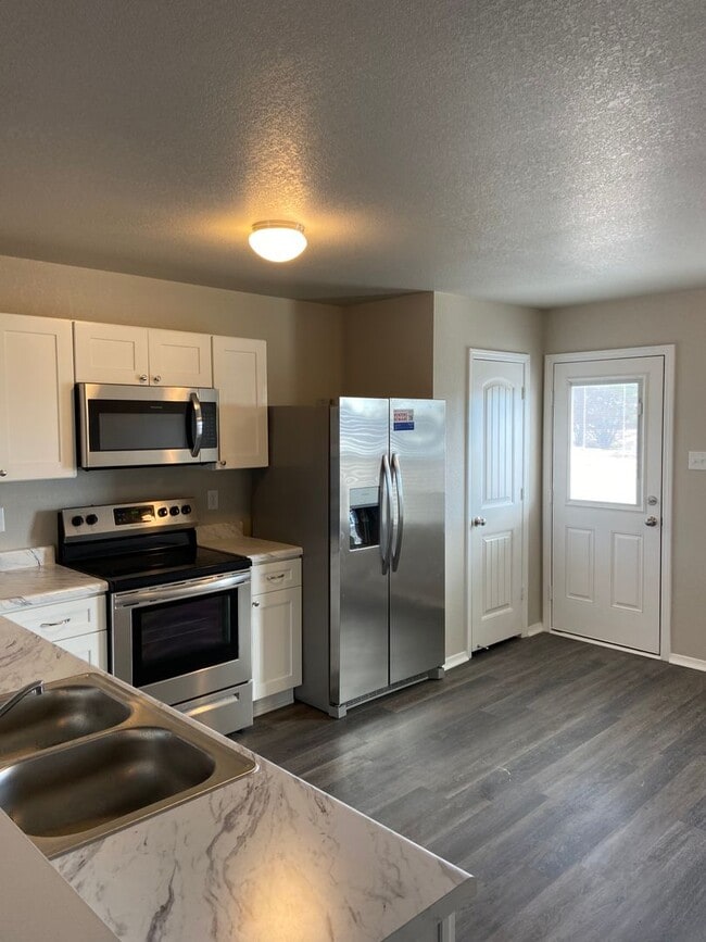 Building Photo - *Pre-Leasing* Four Bedroom | Two Bathroom ...