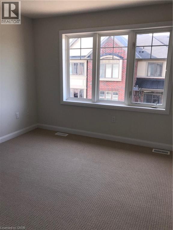 Photo du bâtiment - 1169 Garner Rd E