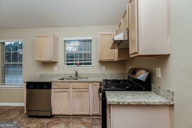 Building Photo - 6144 Idlewood Manor