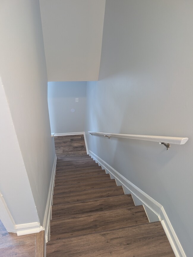 Stairs from Upstairs to Main area - 1109 Holmespun Dr