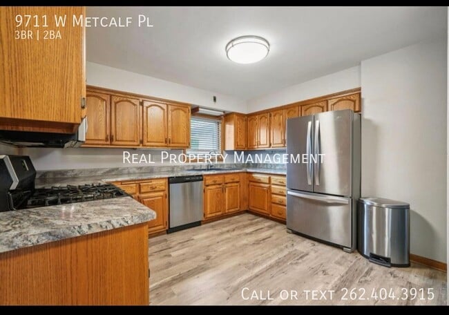 Foto del edificio - 9711 W Metcalf Pl