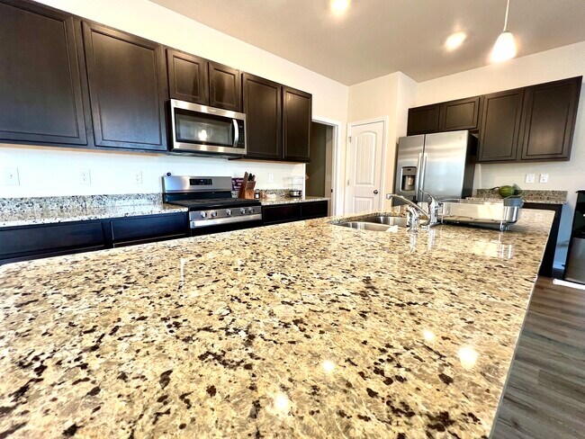 Foto del edificio - 5744 Heathland Terrace
