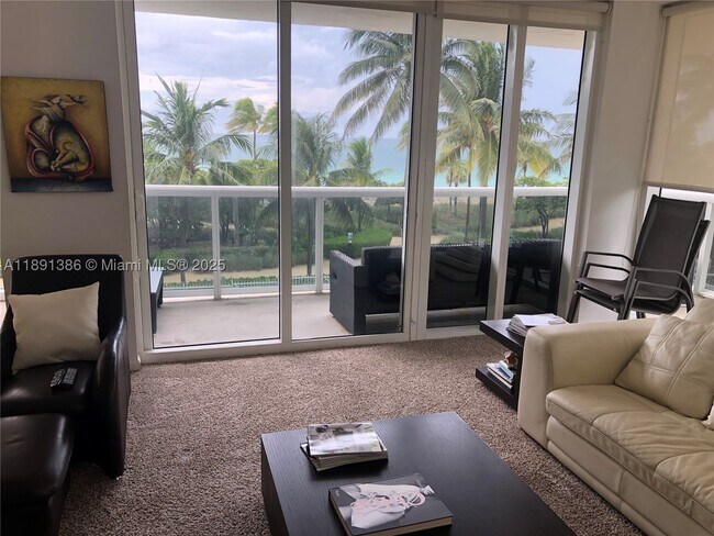Building Photo - 10275 Collins Ave