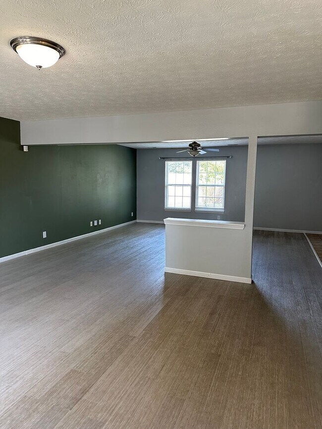 Building Photo - Charming 4-Bedroom Home with Fenced-In Bac...
