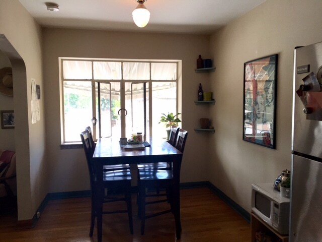 Dining Area (ceiling fan just added) - 1000 E 8th Ave