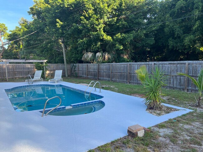 Building Photo - Single Family Pool Home with private fenced yard!