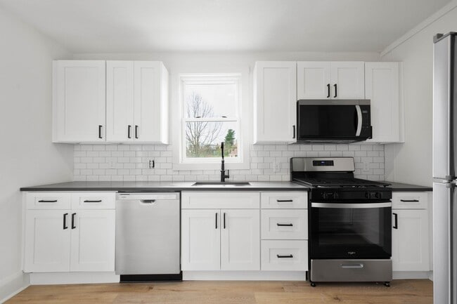 Building Photo - 2 BEDROOM END UNIT IN THE HEART OF DORMONT...