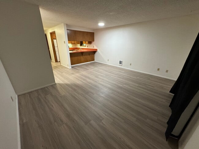 Living room and dining area - 1293 City View St