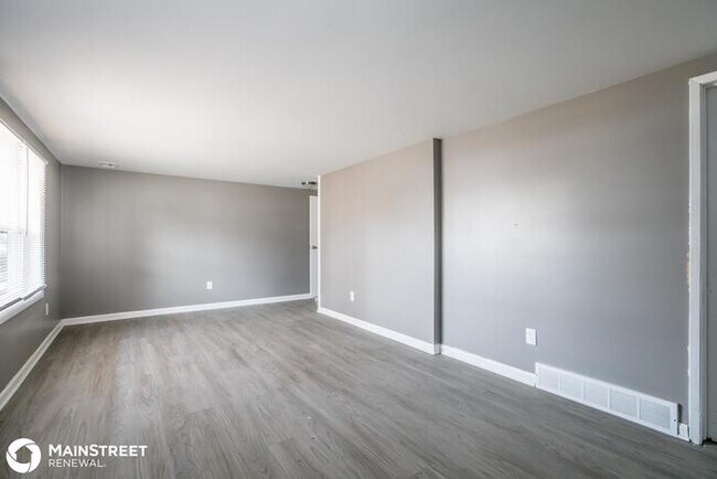 Building Photo - 5657 N Tullis Ave
