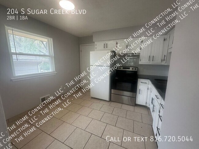 Foto del edificio - 204 S Sugar Creek Blvd