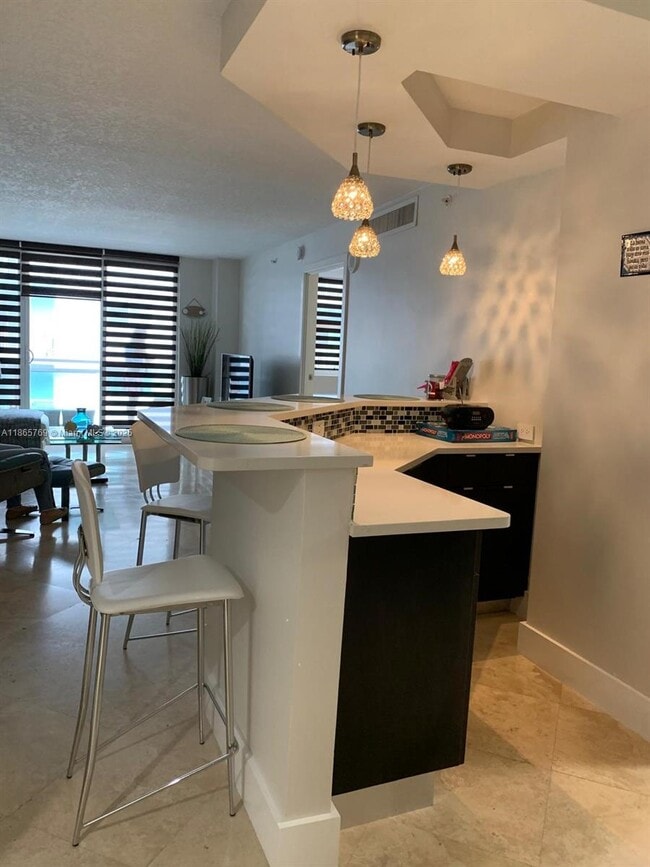 Building Photo - 6917 Collins Ave