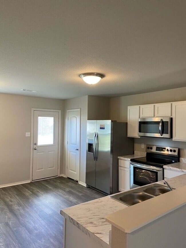 Building Photo - *New Years Special* BRAND NEW Four Bedroom...