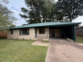 Building Photo - 1104 S Gee St