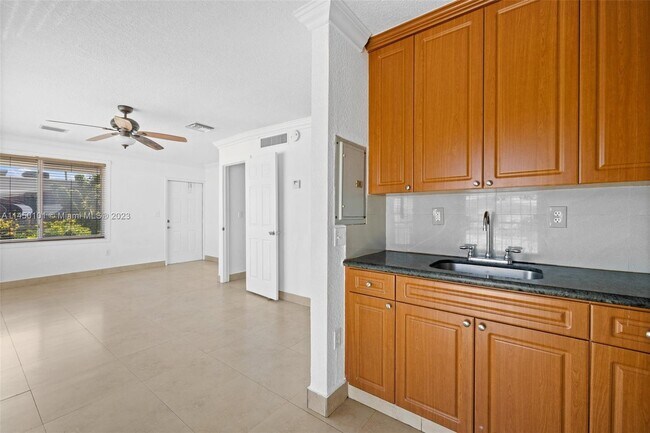 Building Photo - 1174 W 69th Pl