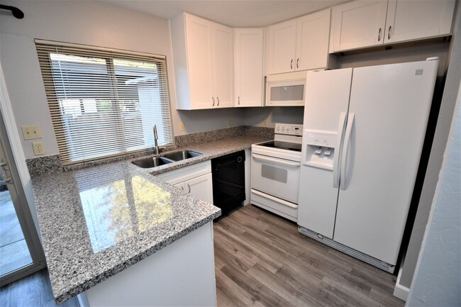 Building Photo - 8744 Woodman Way