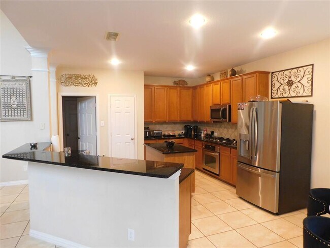 Foto del edificio - 5527 Baron Ridge Ln