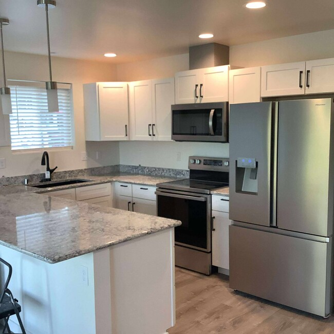 Open kitchen adjacent to living room - 2417 Snyder Ave