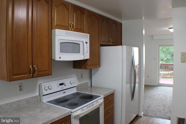 Building Photo - 6905 Woodstream Turn