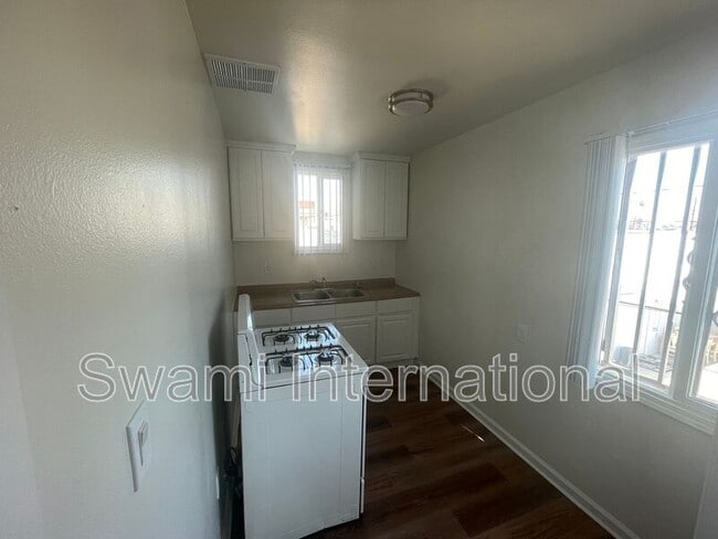 Building Photo - 9449 Normandie Ave