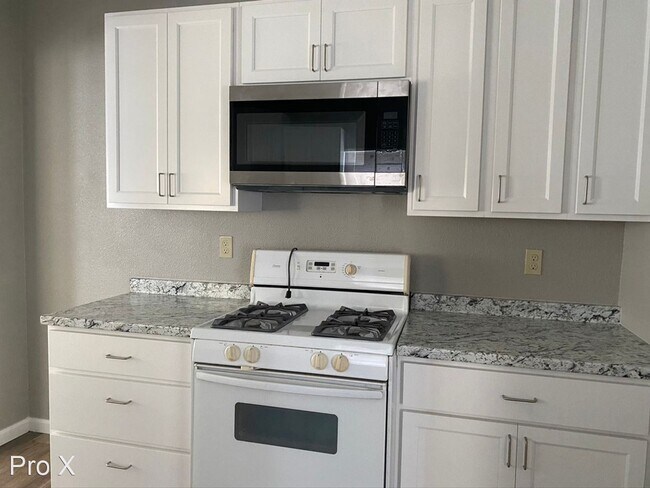 Foto del edificio - 4 br, 3 bath House - 411 W. 4th