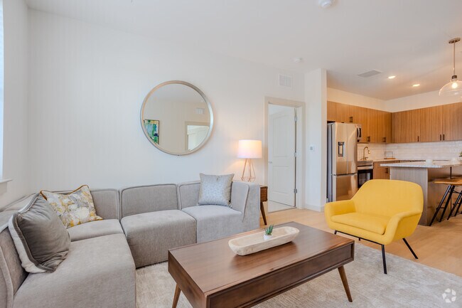 2BR, 2BA - 925SF - Verbena Living 1 Room - Meridian at Wylie - 55+ Affordable Apartments
