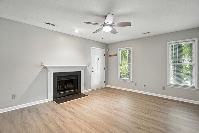 Building Photo - Spacious 2-Bedroom, 2.5-Bath End-Unit Town...