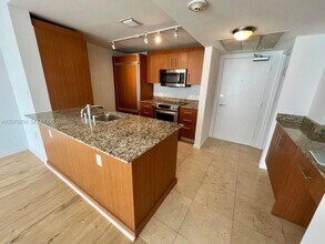 Building Photo - 10275 Collins Ave