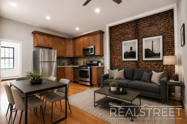 Building Photo - Renovated 3 BR with W/D! in Bed Stuy Townhouse