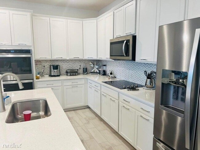 Building Photo - 3 br, 2.5 bath House - 6190 Oceanaire Way