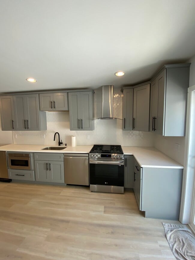 First floor, kitchen cabinets appliances - 1525 Manton St